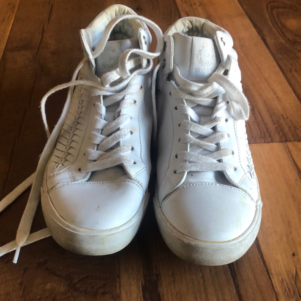 Guess high top leather sole sneakers.